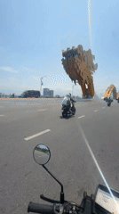 Motorcyclist crosses iconic Dragon Bridge in Da Nang
