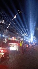 Crowded nighttime street event in Sekarpuro draws motorcycles and crowds