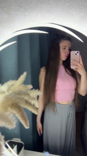 Woman documents evening routine with selfies before night drive