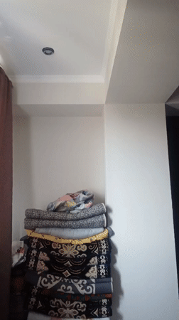 Indoors: bedroom storage and a stash of strollers and bikes