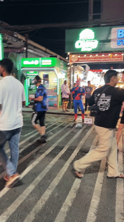 Patong Beach nightlife district bustling with typical Saturday evening crowds
