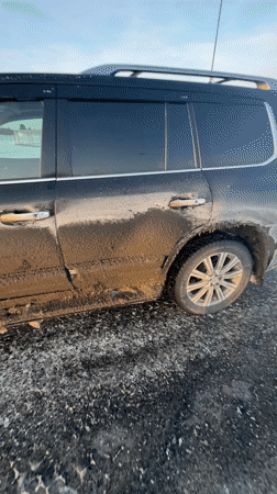 Man documents mud-covered SUV during Russian road trip