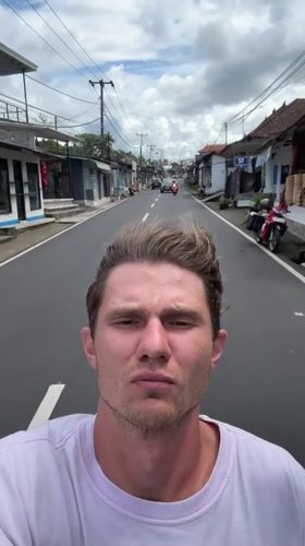Motorcyclist Films Selfie While Riding in Tegallalang, Indonesia
