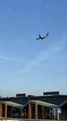 Commercial aircraft observed on routine descent over urban area