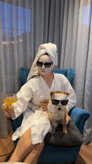 Woman and Shiba Inu photographed together in Carnikava home