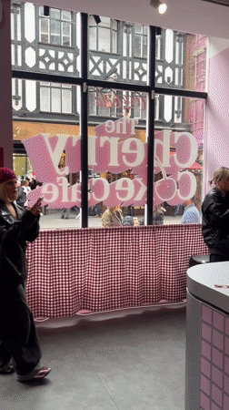 Londoners frequent colorful themed cafes and restaurants Friday afternoon