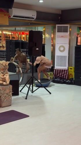 Evening gym session in full swing at a Kuta fitness center