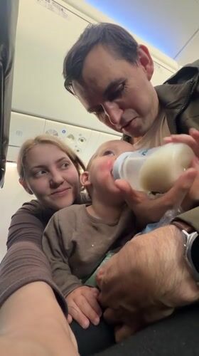 Family with baby observed feeding during flight at Domodedovo