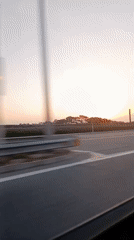 Highway drive through Azerbaijan at golden hour