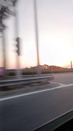 Highway drive through Azerbaijan at golden hour
