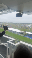 Horse racing and commemorative plaque observed at Epsom