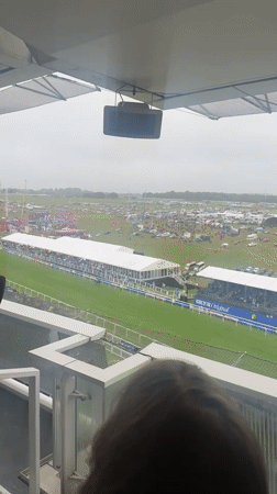 Horse racing and commemorative plaque observed at Epsom