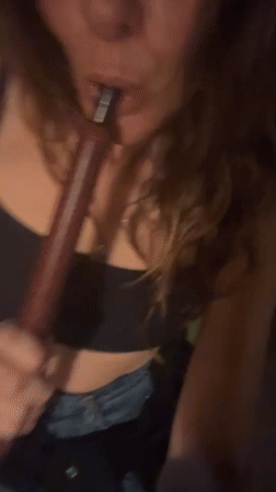 Woman enjoys hookah session at North Kuta lounge