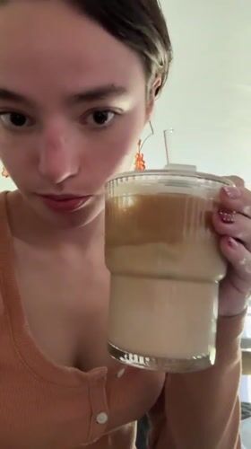 Iced coffee and polka dot nails in Tlaxcalancingo