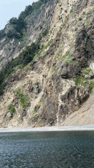 Rugged cliff coastline rising from the water in Russia's far east