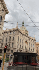 Milan street scene documented under overcast afternoon sky