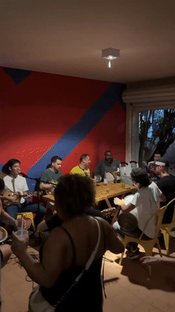 Musical gathering at São Paulo bar features instruments and drinks