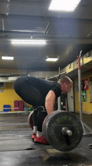 Weightlifter performs deadlifts at Blagoveshchensk gym