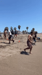 Sunny afternoon beach activities unfold in Arica, Chile