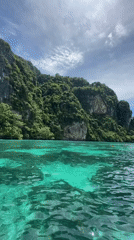 Ao Nang's turquoise bays and limestone cliffs from the water