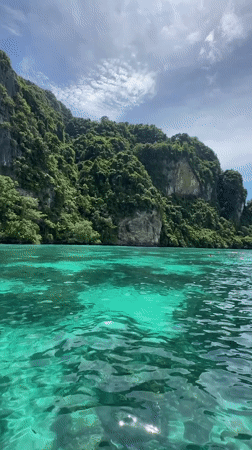 Ao Nang's turquoise bays and limestone cliffs from the water