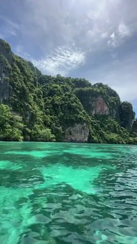 Ao Nang's turquoise bays and limestone cliffs from the water