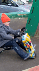 Boy rides electric drift trike on Moscow playground