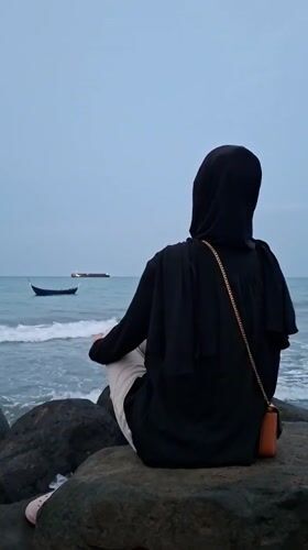 Quiet afternoon on the Lhokseumawe shoreline, rocks and open water