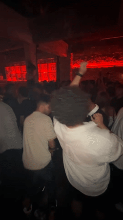 Inside Illum KL on a busy red-lit club night
