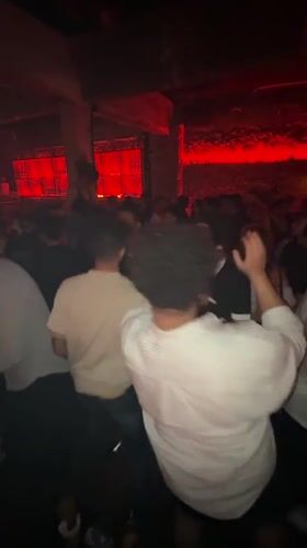 Inside Illum KL on a busy red-lit club night