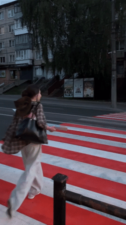 Late-night crosswalk scene in Ternopil, Ukraine