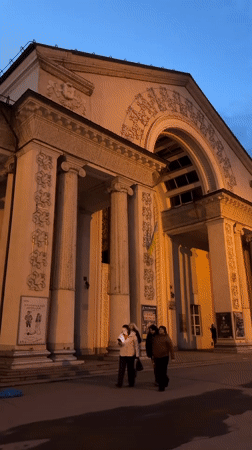 Evening scenes captured in Kryvyi Rih: illuminated building, woman's portrait