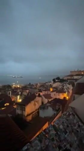Evening observations capture Lisbon's rooftops and street scenes