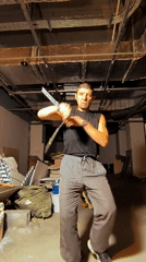 Spinning weapons practice in a Karaganda basement workshop