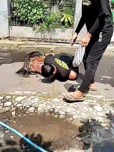 Street activity with traditional objects observed in Pereng, Indonesia
