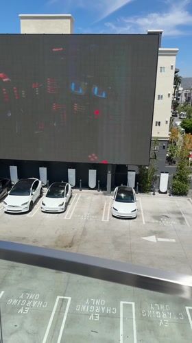 Tesla charging station with digital display documented in West Hollywood