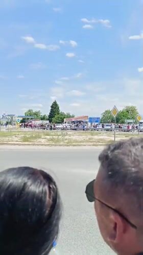 Crowd gathers at Septemvri roundabout near gas station