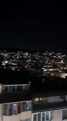 Nighttime cityscape viewed from elevated position in Veliko Tarnovo