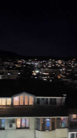 Nighttime cityscape viewed from elevated position in Veliko Tarnovo