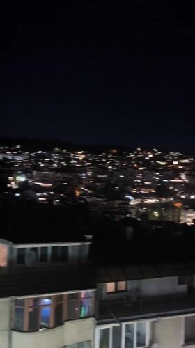 Nighttime cityscape viewed from elevated position in Veliko Tarnovo