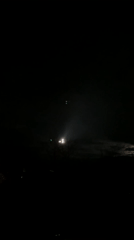 Helicopter departs Sofia at night with lights visible