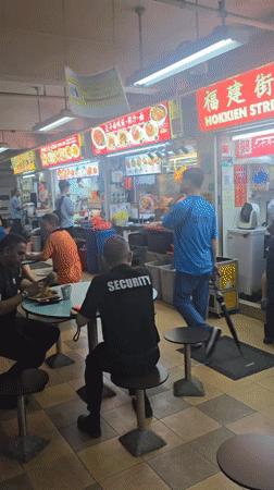 Singapore food court and rainy street scenes documented