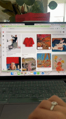 Person browsing Pinterest on laptop in Puebla home setting