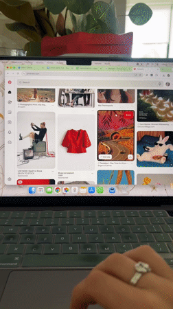 Person browsing Pinterest on laptop in Puebla home setting