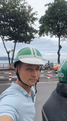 Motorcycle passenger spotted in coastal Nha Trang, Vietnam