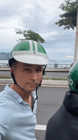 Motorcycle passenger spotted in coastal Nha Trang, Vietnam