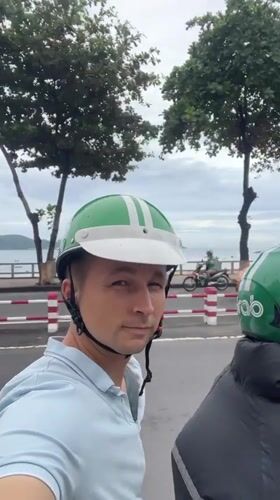 Motorcycle passenger spotted in coastal Nha Trang, Vietnam