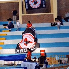 Banner displayed in stadium seating area in Miraflores