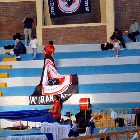 Banner displayed in stadium seating area in Miraflores