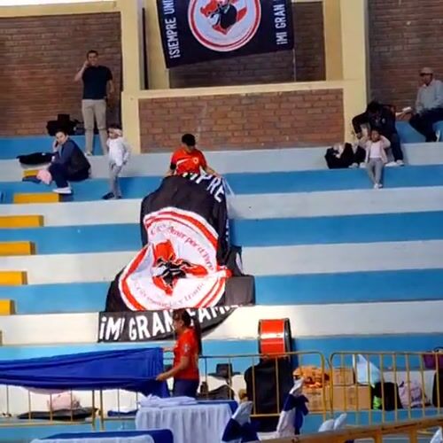 Banner displayed in stadium seating area in Miraflores